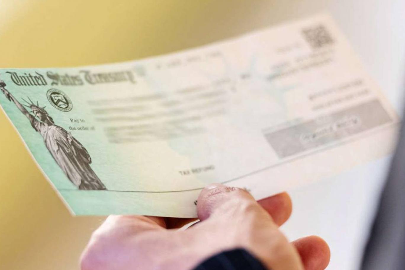 abd nin 1200 dolarlik nakit destegi