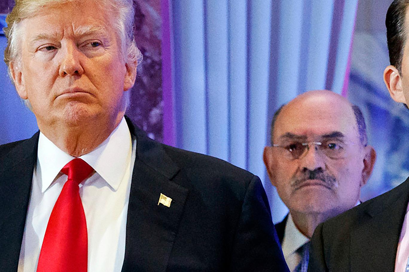 Allen Weisselberg (right) next to Donald Trump in 2017 (AP)
