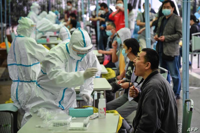 afp_china_wuhan_mass_screening_14May20.jpg