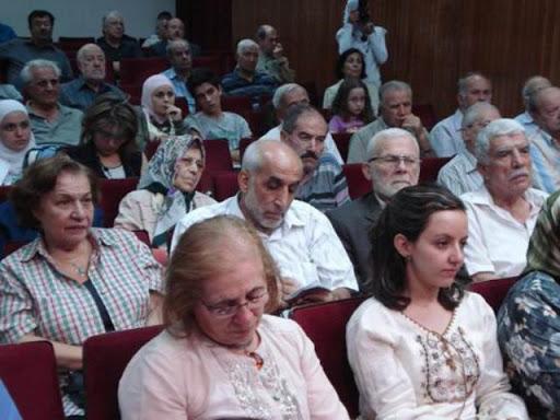 Muhammed Kurd Ali, bir kültür konfrenasında söyleşirken.jpg