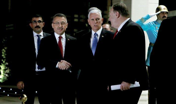 17 Ekim 2019, ABD Başkan Yardımcısı Mike Pence, Türkiyeli mevkidaşı Fuat Okya ile el sıkışıyor. Ardından ABD Dışişleri bakanı Mike Pompeo, sarayda Cumhurbaşkanı R. Tayyip Erdoğan ile buluşmaya gidecek..jpg