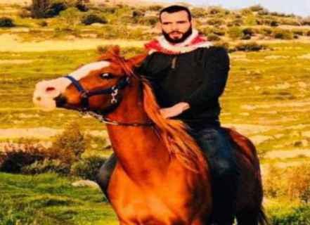 İsrail kolluk kuvvetleriyle çatışmada katledilen Filistinli gencin eski fotoğrafı.jpg İsrail kolluk kuvvetleriyle çatışmada katledilen Filistinli gencin eski fotoğrafı.jpg