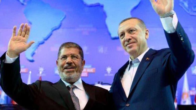 Dönemin Başbakanı Erdoğan ile Mısır'da cumhurbaşkanı seçilen Muhammed Mursi ile İstanbul'daki bir konferans buluşması-Kaynak- eeradicalization.c.jpg