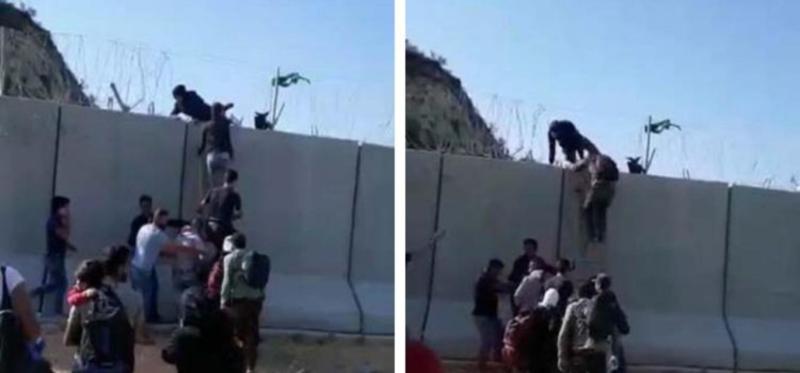 Türkiye'nin huduttaki duvarını merdivenle aşan  Afgan göçmenleri.jpg