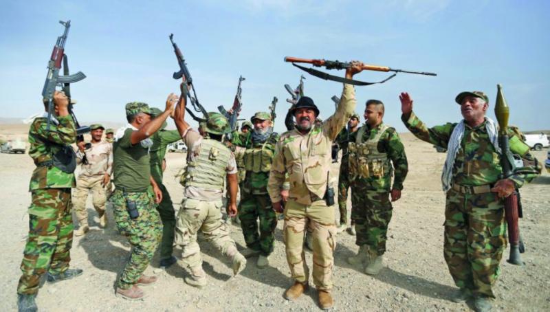 ABD'ye meydan okuyan Iraklı milisler.jpg