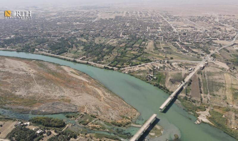 Irak-Suriye sınırındaki BuKemal köprüsü, Fırat Nehri Ve Deyrizor'un havadan görüntüsü. Kaynak-npasyria.com_.jpg