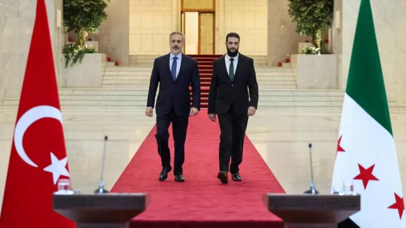 Hakan Fidan ve Colani (Ahmed Hüseyin eş-Şera) Hakan Fidan ve Colani (Ahmed Hüseyin eş-Şera)
