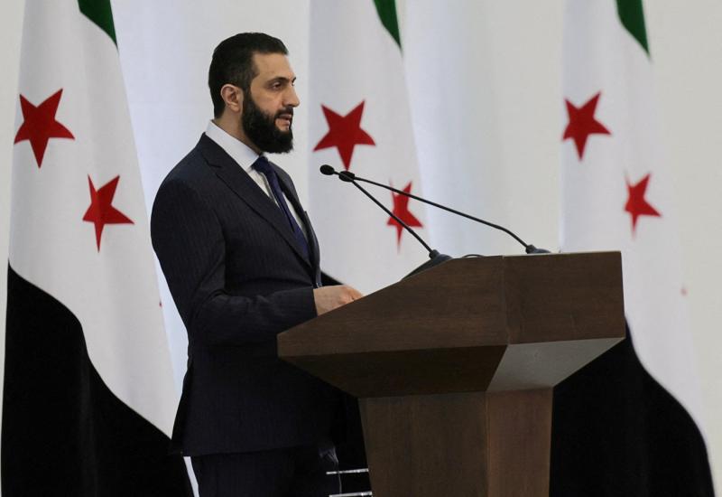 Suriye Cumhurbaşkanı Ahmed eş-Şara, Şam'daki başkanlık sarayında yeni kabine üyelerine hitap ederken, 29 Mart 2025 / Fotoğraf: AFP
