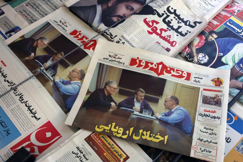 İran gazetesi Vatan-ı Emruz'un "Avrupa'nın dengesizliği" manşeti ve Fransa, Almanya ve Birleşik Krallık liderlerinin toplantısından bir kare / Fotoğraf: EPA