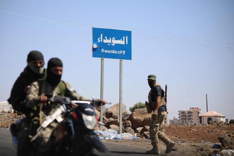 Suriye'nin Suveyda şehrinin girişinde Dürzi savaşçılar, 21 Temmuz / Fotoğraf: AFP