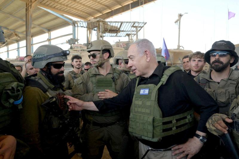 Netanyahu, Gazze Şeridi'nin güneyindeki Refah'ta görev yapan İsrailli askerleri ziyaret ederken, 18 Temmuz 2024 / Fotoğraf: AFP