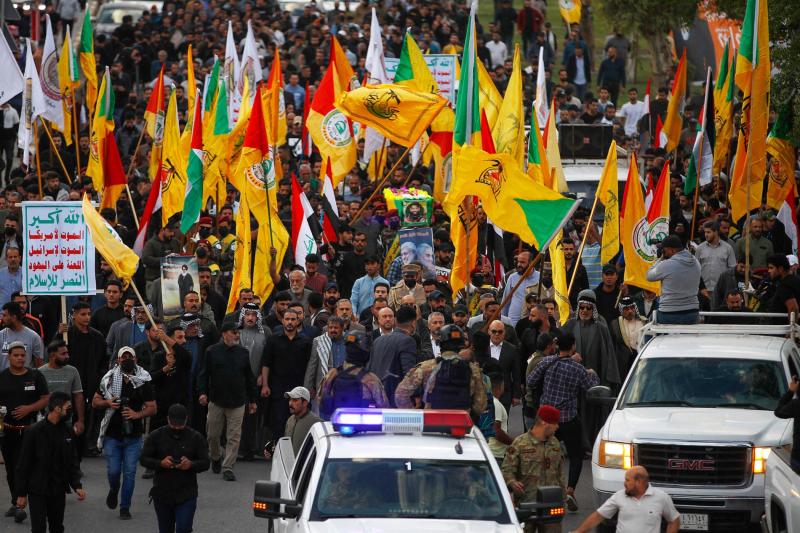 Bağdat'ta, bir İHA saldırısında hayatını kaybeden Hizbullah Tugayları üyesinin cenaze töreni sırasında, 21 Kasım 2023 / Fotoğraf: AFP