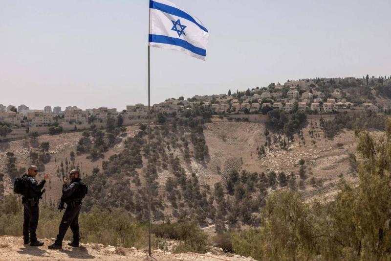 Batı Şeria'da, Kudüs dışındaki ''Maale Adumim'' yerleşim yeri yakınlarındaki ''E1'' bölgesinde iki İsrail polisi / Fotoğraf: AFP (Arşiv)
