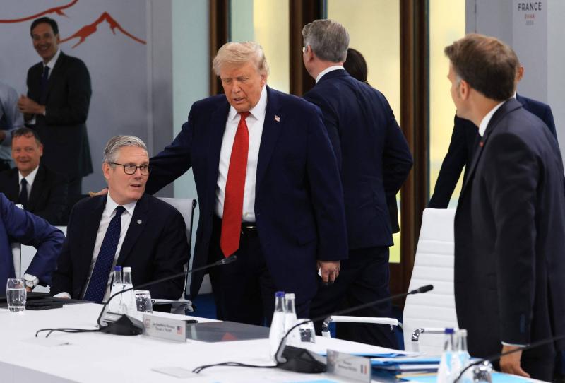 ABD Başkanı Donald Trump, Fransa’nın doğusundaki Evian’da düzenlenen G7 Zirvesi’nde Starmer ve Macron ile birlikte / Fotoğraf: AFP
