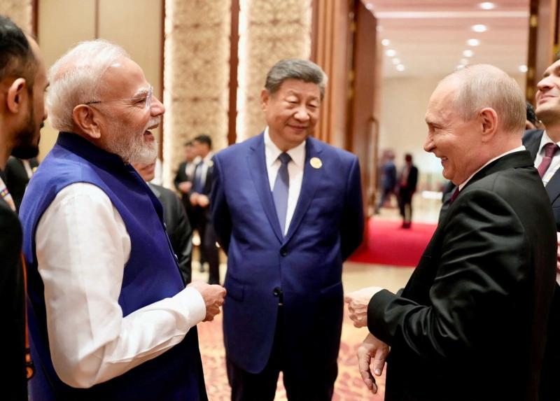 Hindistan Başbakanı Narendra Modi, Rusya Devlet Başkanı Vladimir Putin ve Çin Devlet Başkanı Şi Cinping ile Hindistan'ın Yeni Delhi kentinde düzenlenen BRICS zirvesinin ikinci gününde bir araya geldi, 13 Eylül 2026 / Fotoğraf: Reuters